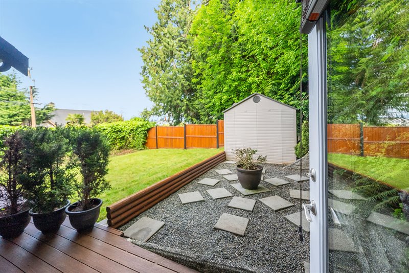 Main Level Bedroom- Door to Side Yard