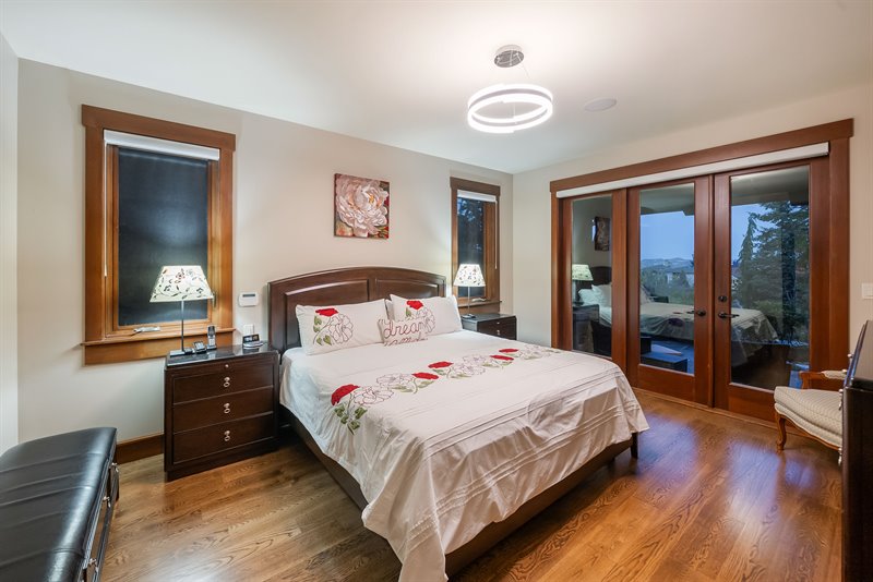 Primary Bedroom Suite - Door to Patio (Twilight)