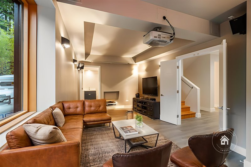 Lower Level - Theatre Room | Bedroom (Virtual Staging)