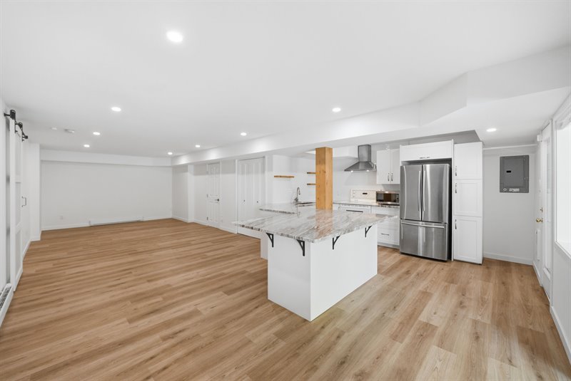 Lower Level Legal Suite - Living | Dining Area & Kitchen