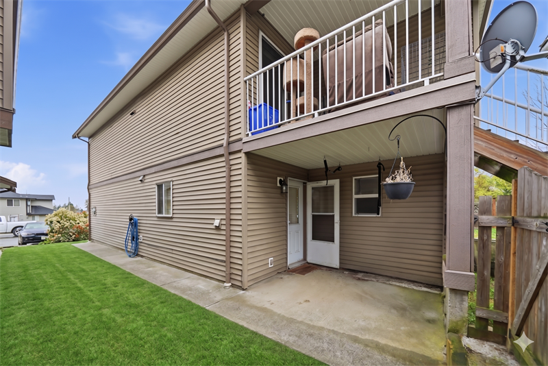 Suite - Patio (Landscaping Virtually Enhanced)