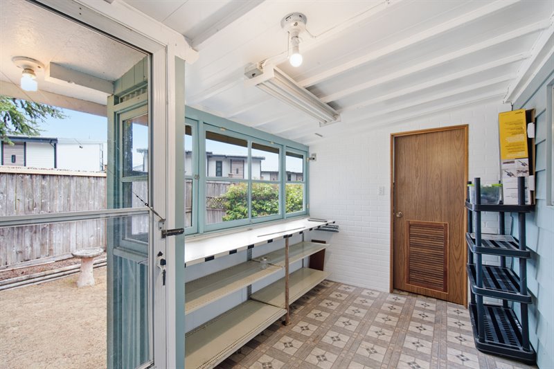 Enclosed Back Porch - Door to Storage Room